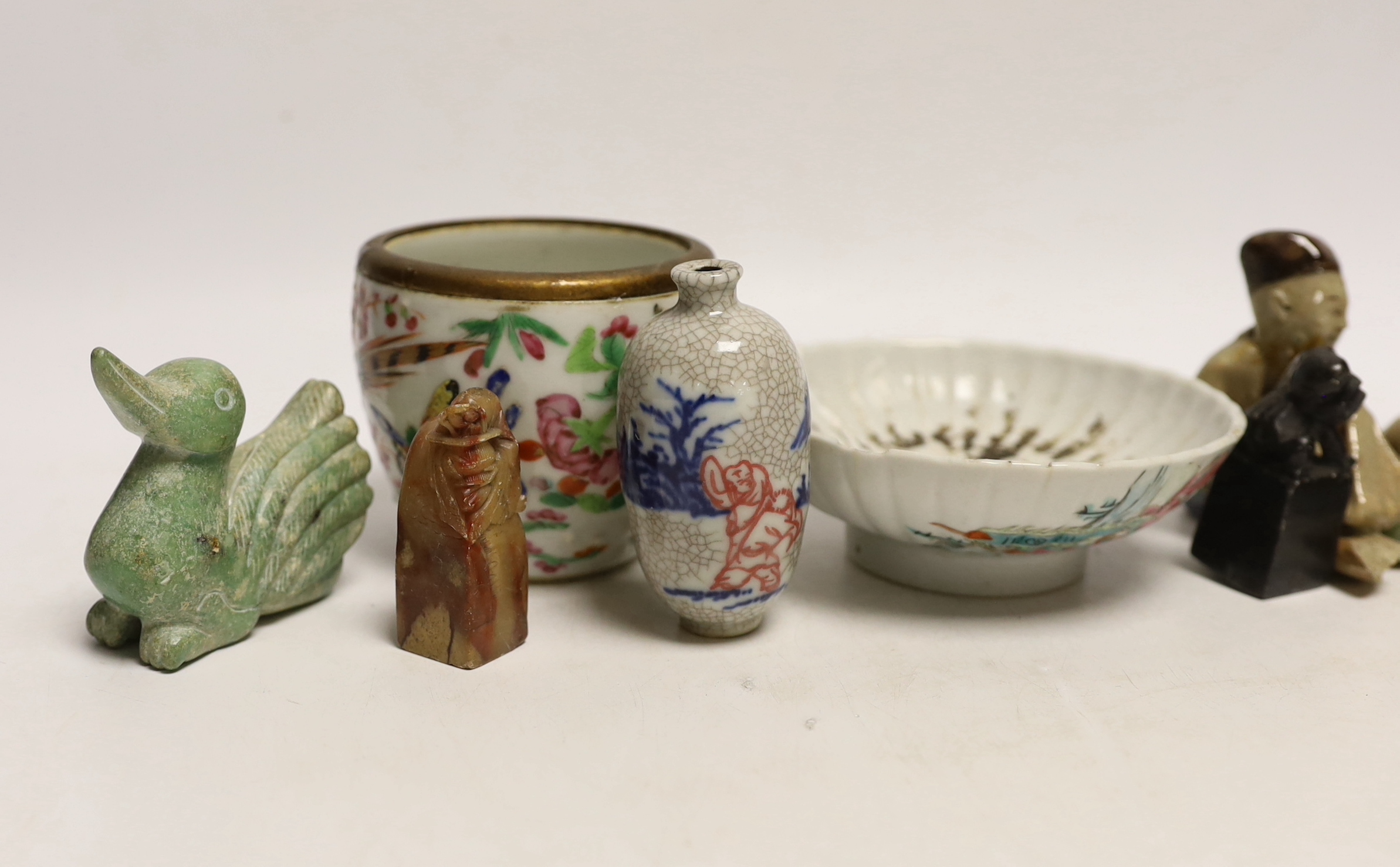 Three Chinese seals, three hardstone carvings and three pottery glazed figures and a 19th century Chinese famille rose pot, crackle glaze snuff bottle and a pedestal dish, 11.5cm